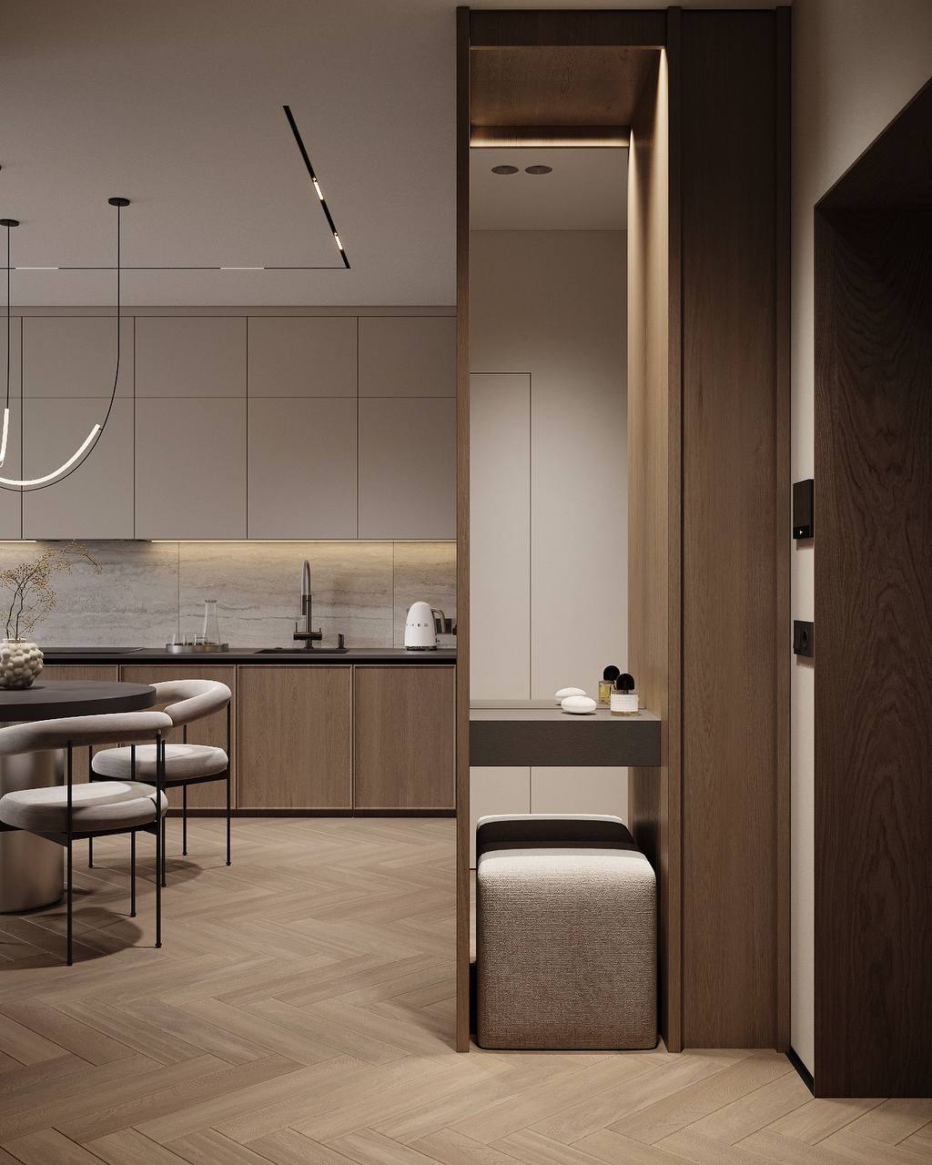 A tall mirror, a compact upholstered seat and a small shelf integrated into the entrance cabinetry.